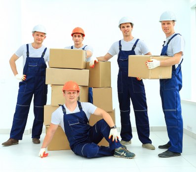 Student removals team helping with boxes and furniture in Barnet