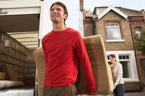 Careful loading of student belongings for a move in Barnet