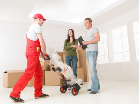 Worker assessing a removal task and handling equipment carefully